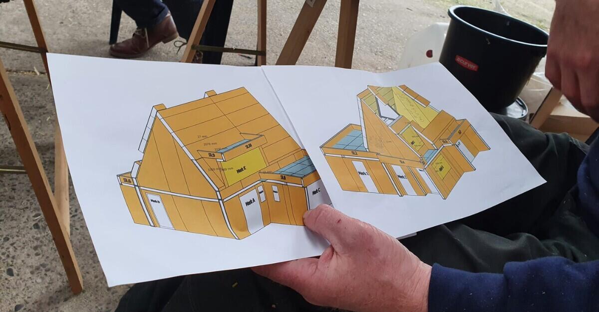 Een 3D-model van een gebouw met strobouwelementen.